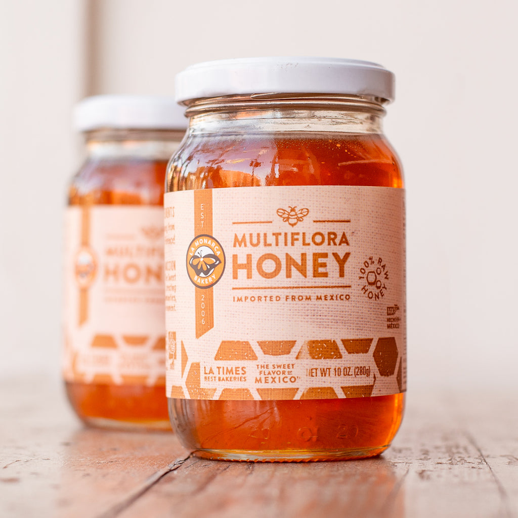 two jars of multiflora honey 